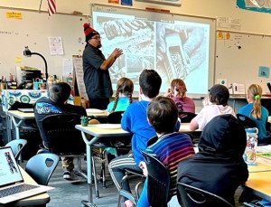 Jason LaClair teaching students Coast Salish Art forms,